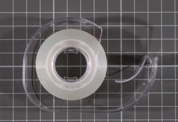 Thin tape for taping film to cassette